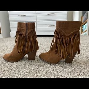 Brown fringe heeled boots